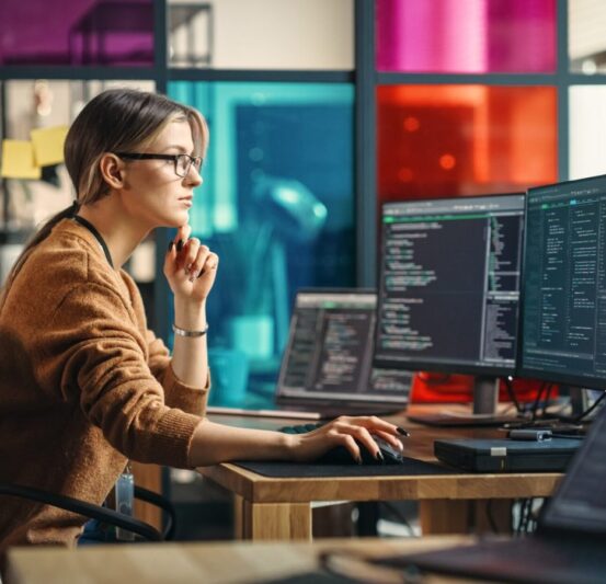 Female,Junior,Software,Engineer,Writes,Code,On,Desktop,Computer,With